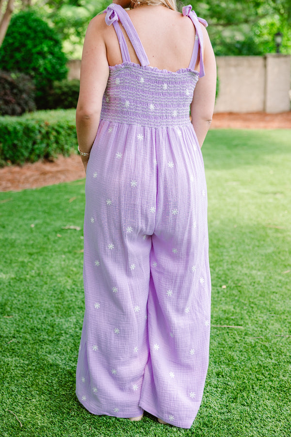 Chic Soul Plus size clothing, lilac linen jumpsuit with embroidered flowers and bows that tie together to make the straps 
