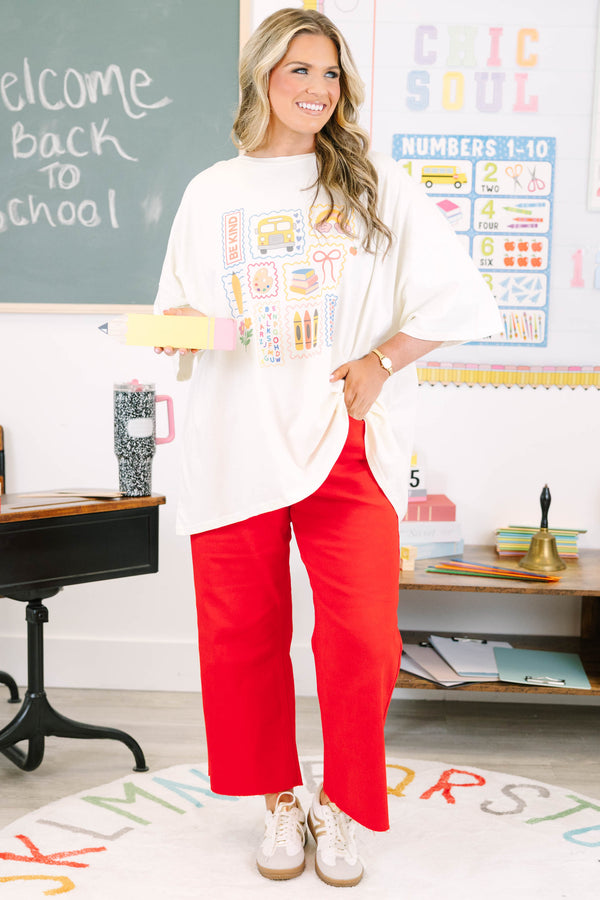 Plus size ivory oversized boyfriend tee with colorful school-themed graphics.