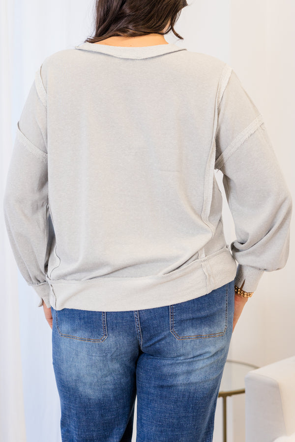 
Chic Soul plus size clothing, light grey long sleeve sweater with two toned outer stitching detail with round neckline and cuff sleeves with band along bottom with slits on each side
