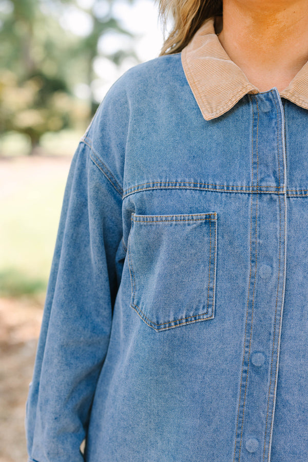 Plus Size denim jacket with a tan corduroy collar, chest pockets, and button-down front.