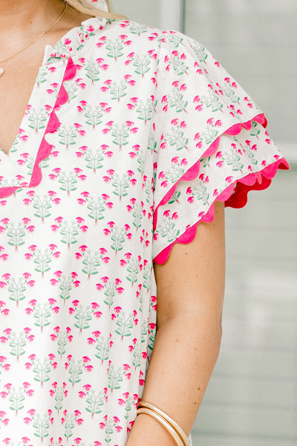 Chic Soul plus size clothing, ivory and pink short sleeve top with a block pattern and pink scalloped details on the sleeves and neckline 