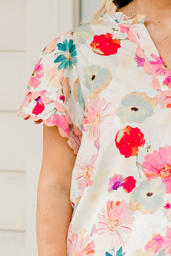 Chic Soul plus size clothing, ivory short sleeve top with multicolored pink and red floral pattern and pastel pink scalloped trim on sleeves and neckline