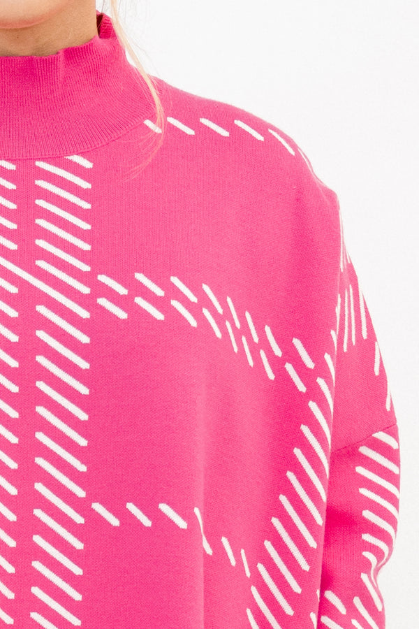 Chic Soul plus size clothing, pink sleeve sweater that has a turtle neck as well a line plaid pattern 