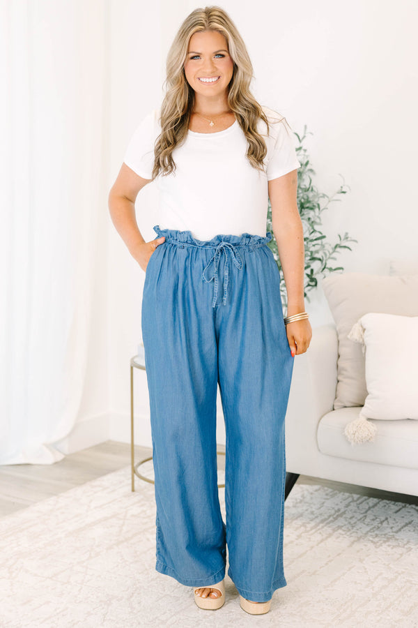 Plus Size medium denim wide-leg pants with a paperbag waist and drawstring tie.