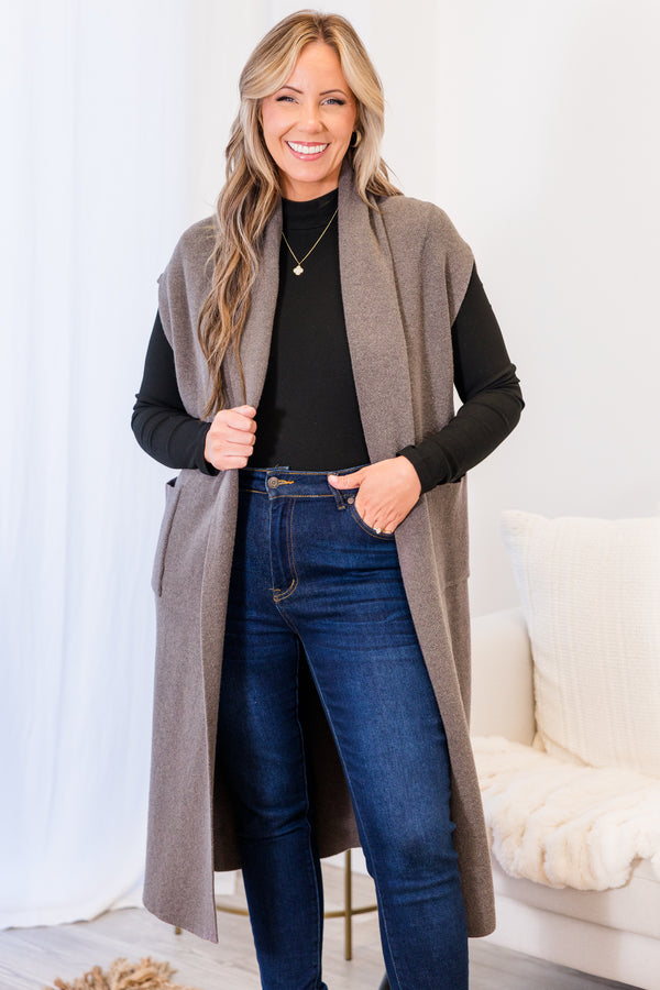 Plus Size knee-length grey sleeveless cardigan with an open front and side pockets.