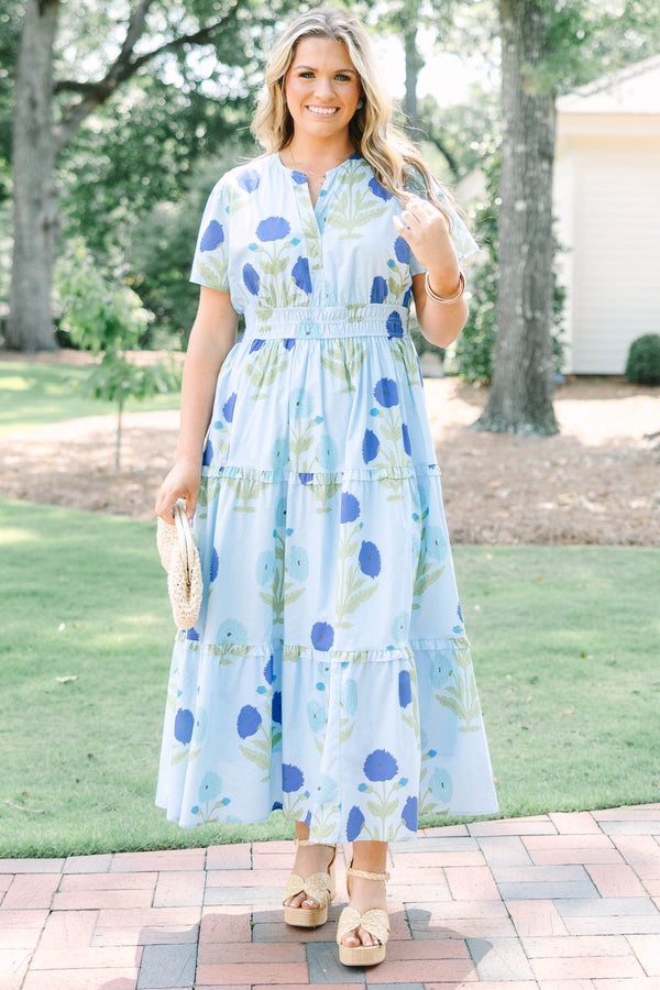 Plus Size light blue floral tiered maxi dress with short sleeves and a v-neckline.