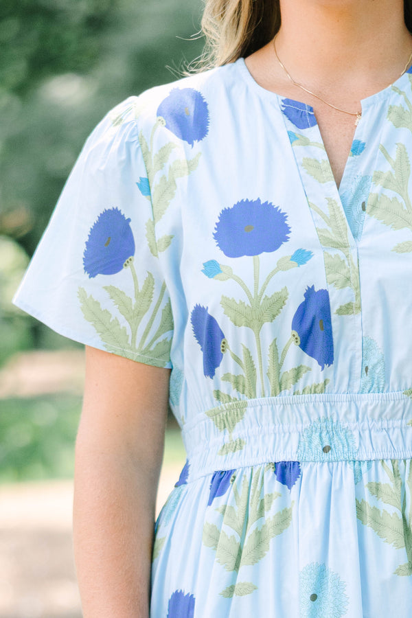 Plus Size light blue floral tiered maxi dress with short sleeves and a v-neckline.