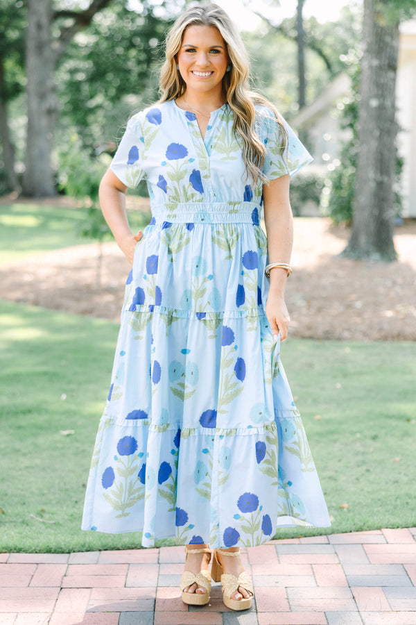 Plus Size light blue floral tiered maxi dress with short sleeves and a v-neckline.