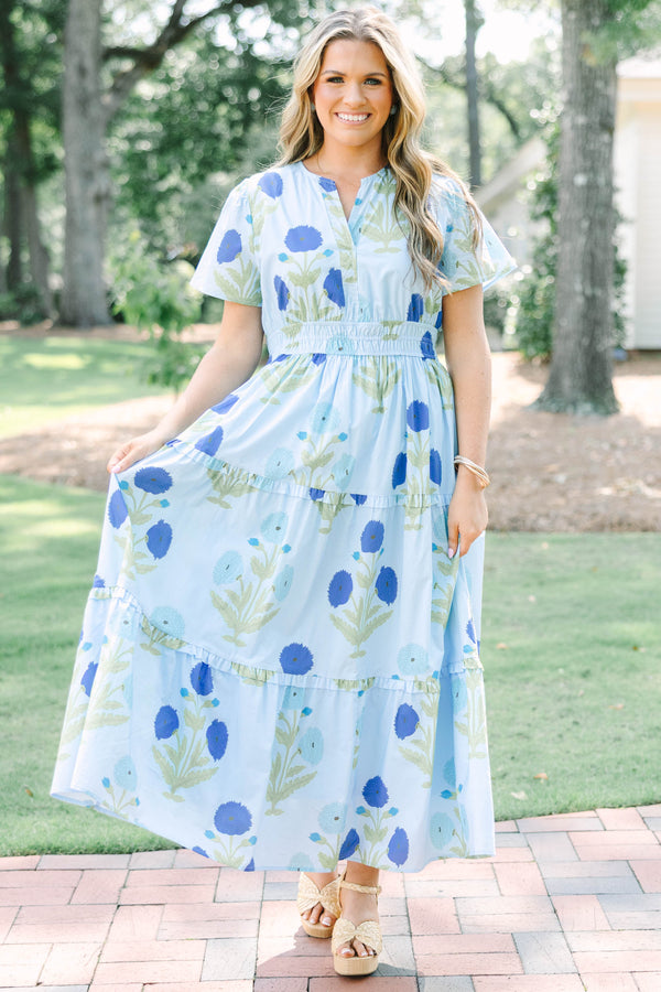 Plus Size light blue floral tiered maxi dress with short sleeves and a v-neckline.