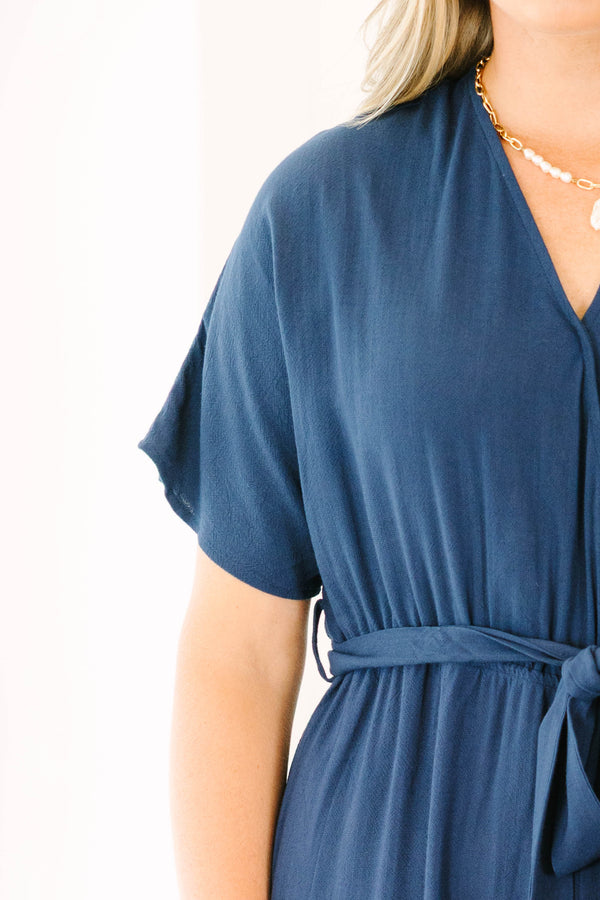 Chic Soul plus size clothing, navy blue short sleeve jumpsuit with waist tie belt and n-neckline