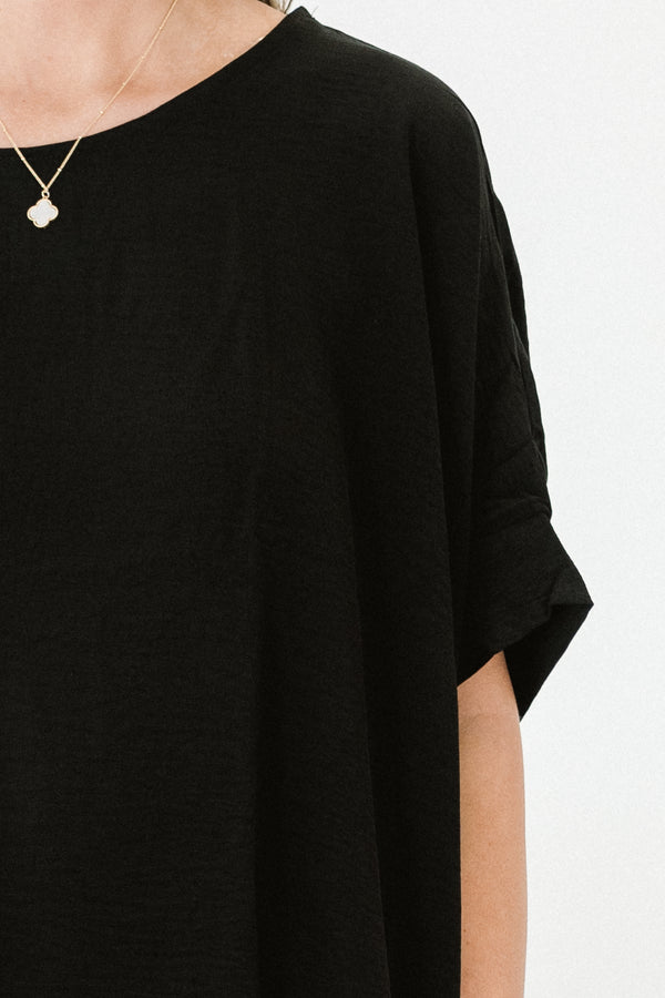 Chic Soul plus size clothing, short-sleeve black top with a high-scoop-neckline and a subtle high-low-hemline