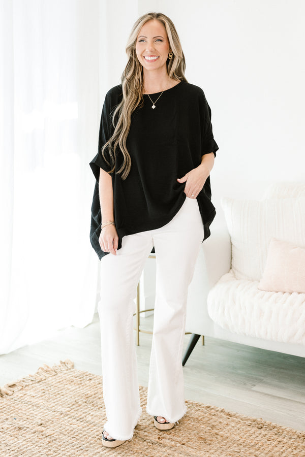 Chic Soul plus size clothing, short-sleeve black top with a high-scoop-neckline and a subtle high-low-hemline