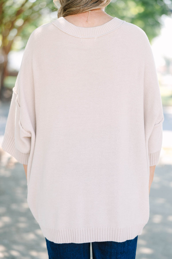 Plus size oatmeal oversized knit sweater with a flowy fit and short sleeves.