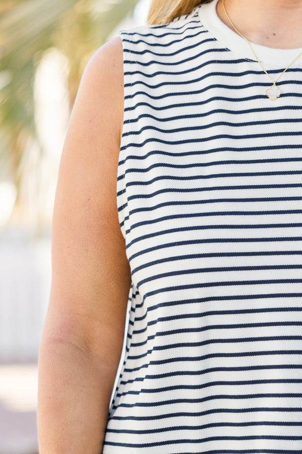 Chic Soul plus size clothing, sleeveless navy and white ruffled baby doll dress with a high-scoop-neckline and striped pattern on top half and bottom half solid navy 