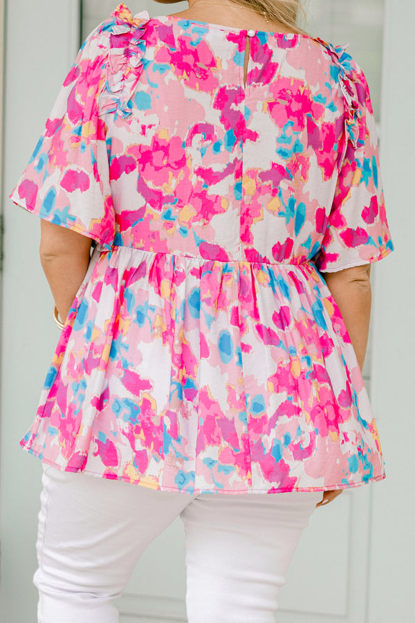 Chic Soul plus size clothing, light pink  short-flutter sleeve rounded neckline babydoll top with abstract warm magenta and cerulean pattern plus a ruched bodice and ruffles on the shoulders