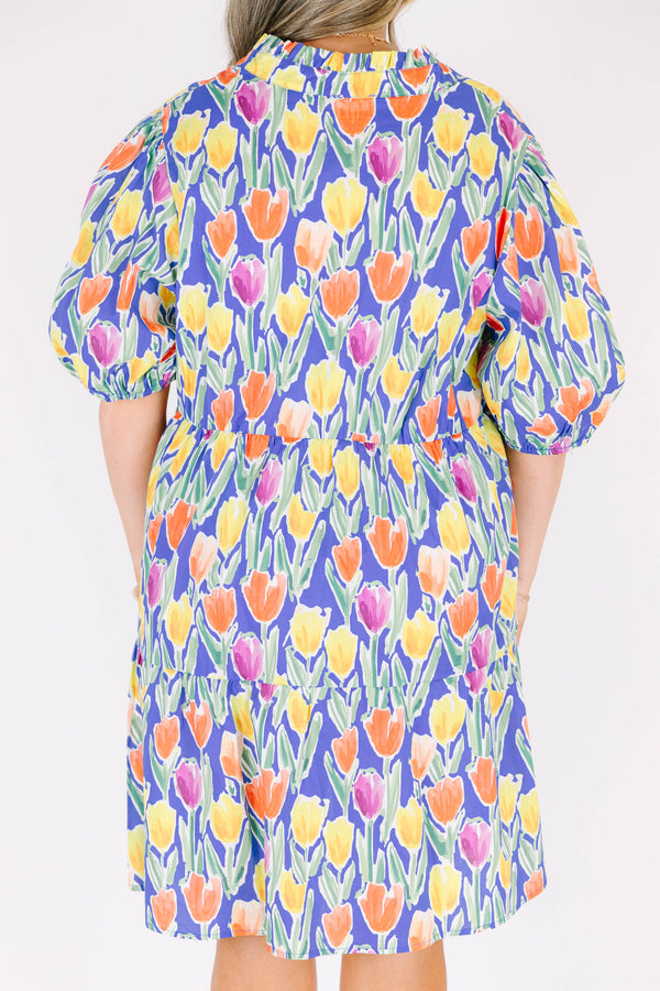Chic Soul plus size clothing, blue short sleeve tiered mini dress with orange/yellow/pink floral tulip print with v cutout along neckline with puff sleeves