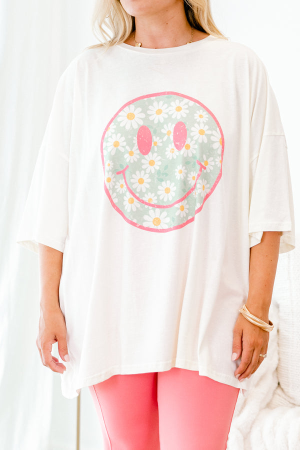 Chic Soul plus size clothing, ivory graphic tee with a pink smiley face on the center of the shirt that is filled with a blue daisy pattern 