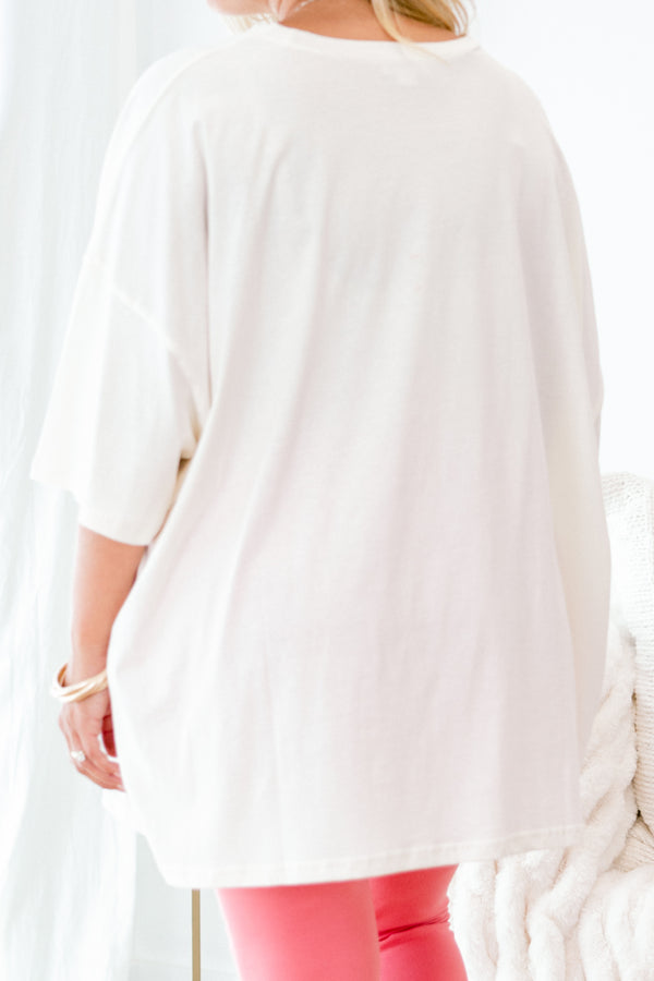 Chic Soul plus size clothing, ivory graphic tee with a pink smiley face on the center of the shirt that is filled with a blue daisy pattern 