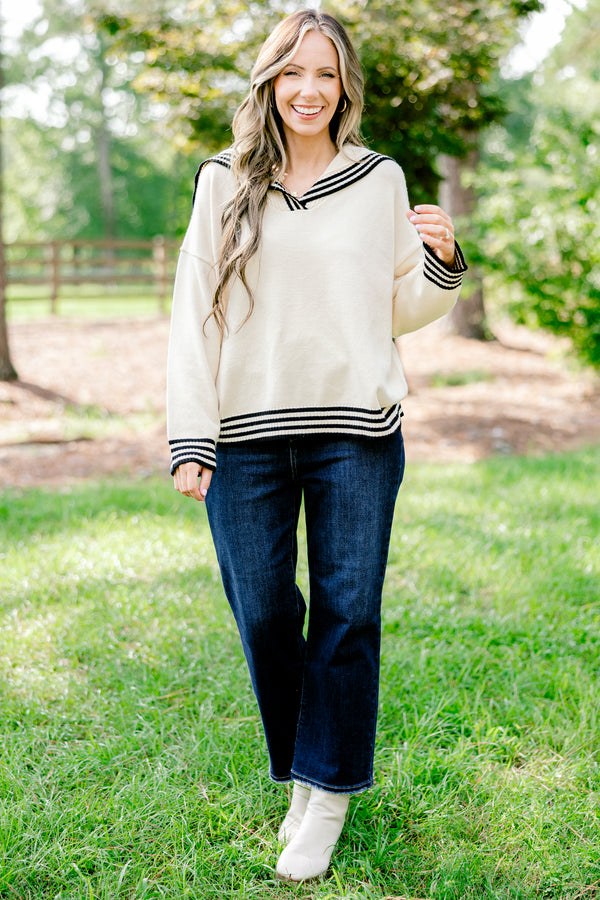 Chic Soul plus size clothing, off-white long sleeve hooded sweater with thin black stripes lining the hem, neckline, and sleeve
