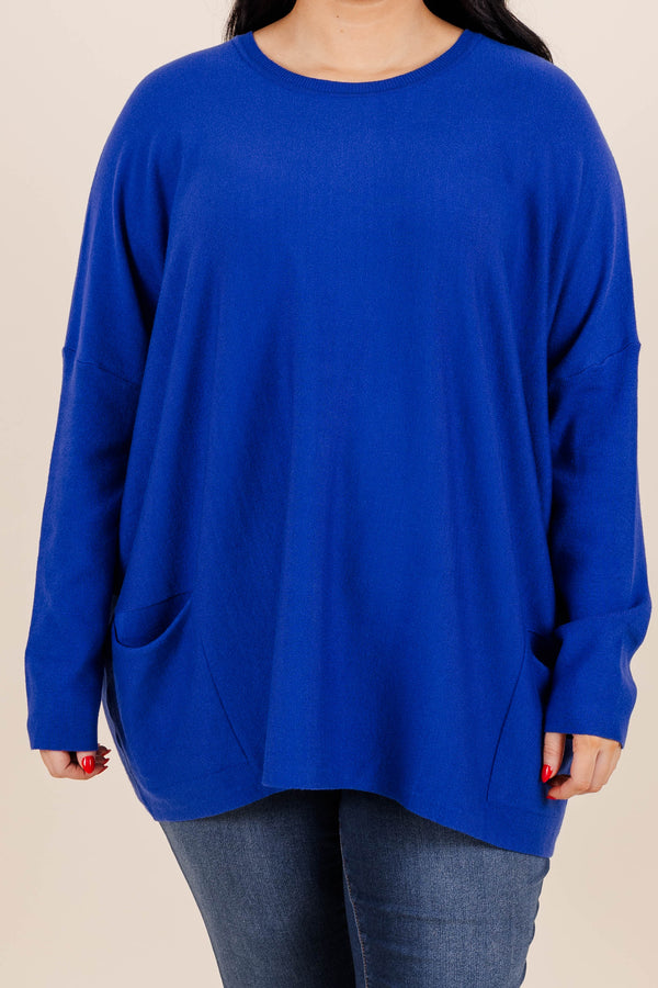 Chic Soul plus size clothing, cobalt blue long sleeve top with front pockets on the bottom