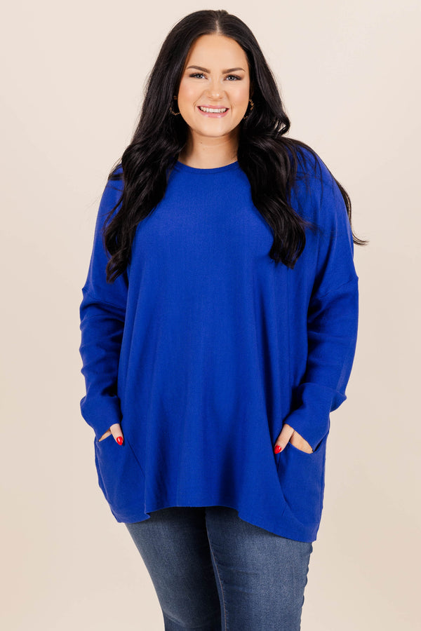 Chic Soul plus size clothing, cobalt blue long sleeve top with front pockets on the bottom