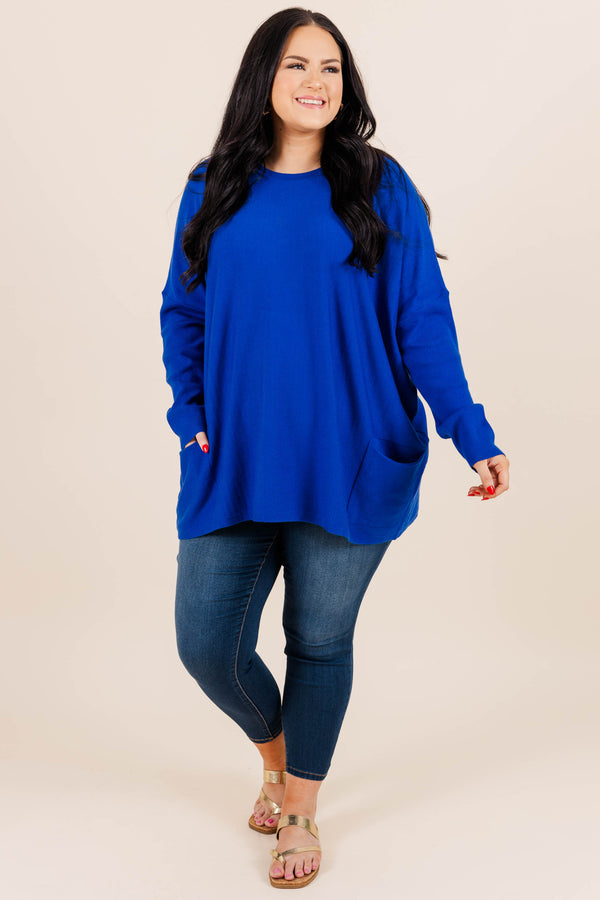 Chic Soul plus size clothing, cobalt blue long sleeve top with front pockets on the bottom