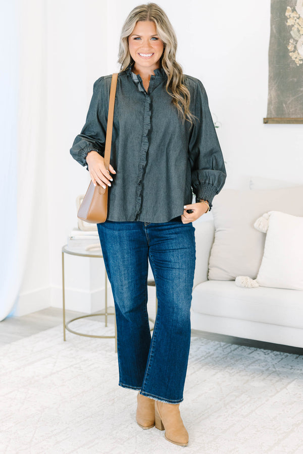 Plus Size black denim-style top with ruffle trim, long puff sleeves, and a button-down front.