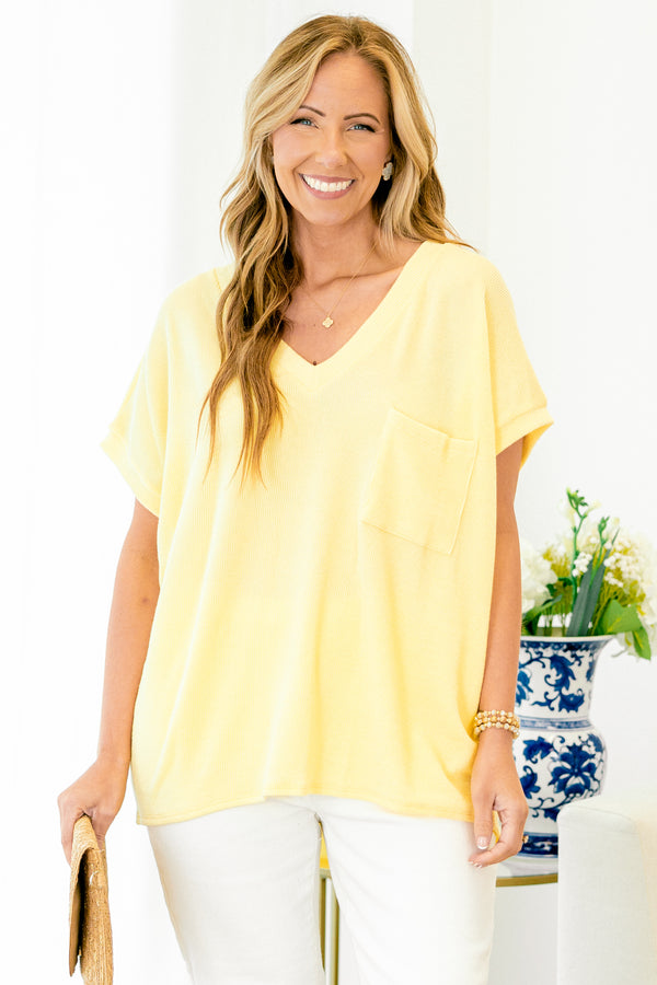 Chic Soul plus size clothing, short-sleeve butter yellow top with a v-neckline and a pocket on the bodice 
