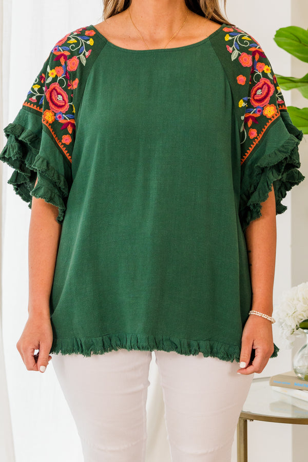 Chic Soul plus size clothing, short sleeve forest green top with ruffled bottom and sleeves with pink floral details on the sleeves
