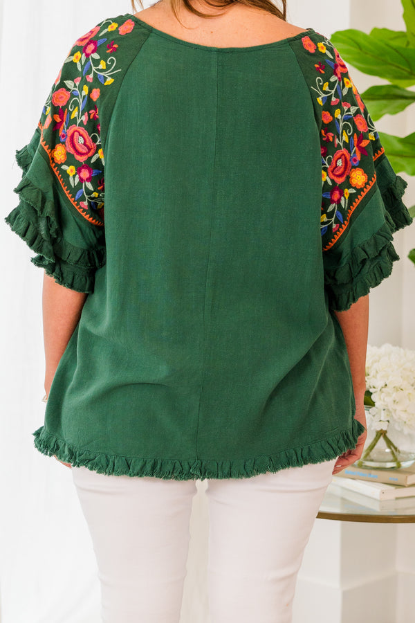 Chic Soul plus size clothing, short sleeve forest green top with ruffled bottom and sleeves with pink floral details on the sleeves