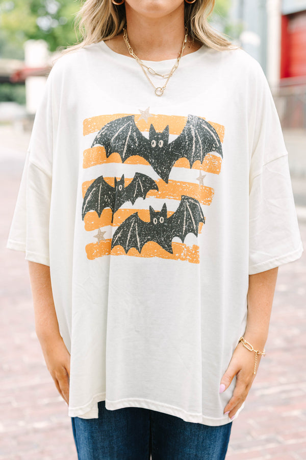 Ivory oversized boyfriend tee with a spooky bat graphic 