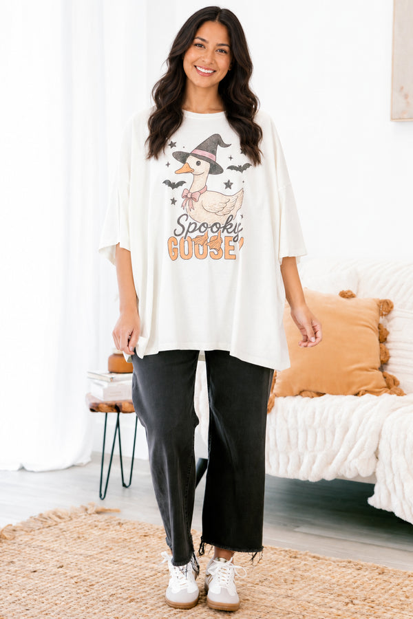Chic Soul Plus size clothing, ivory graphic tee that has a cartoon goose with a witch hat and bats graphic in the middle of the shirt