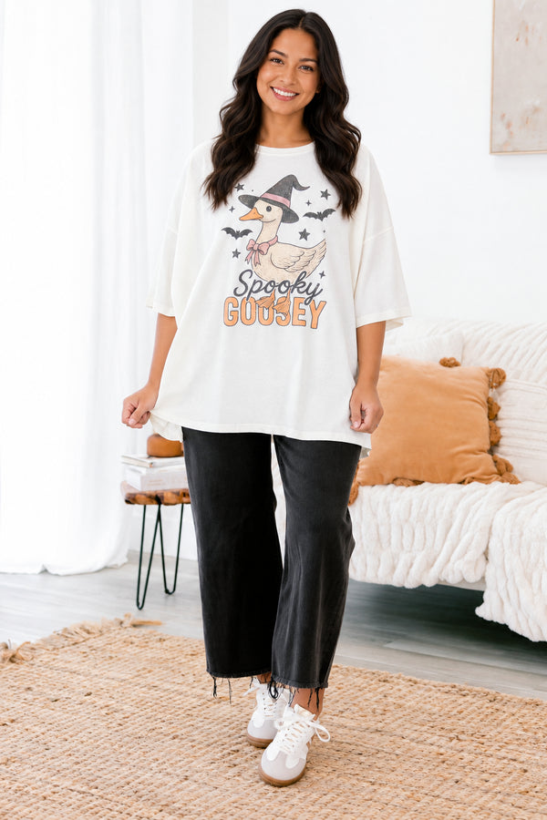 Chic Soul Plus size clothing, ivory graphic tee that has a cartoon goose with a witch hat and bats graphic in the middle of the shirt