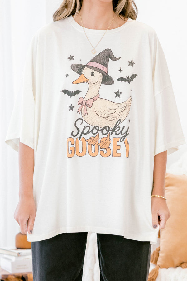 Chic Soul Plus size clothing, ivory graphic tee that has a cartoon goose with a witch hat and bats graphic in the middle of the shirt