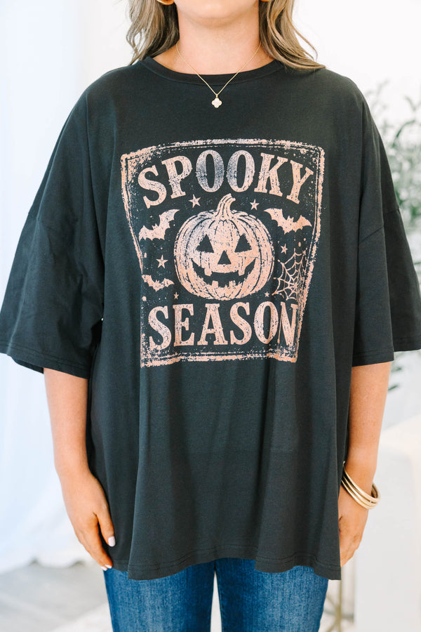 Plus size black boyfriend tee with a rose gold 'Spooky Season' pumpkin graphic and flowy fit.