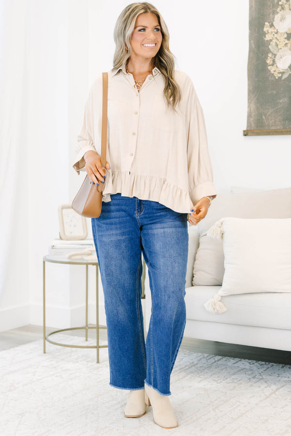 Plus Size dark wash straight leg jeans with a high waist and raw fringe hems.