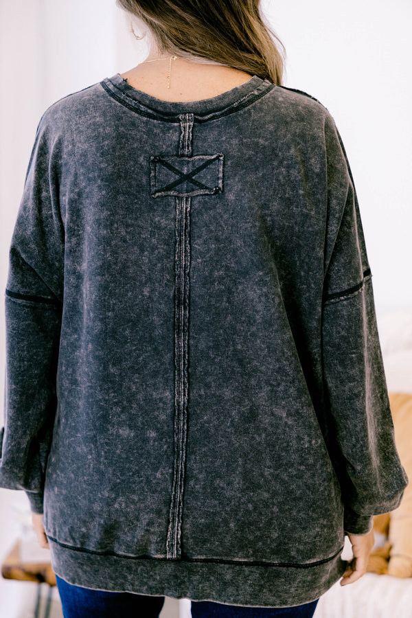 Chic Soul plus size clothing, ash black long sleeve casual top with an acid washed pattern as well as a front pocket and black stitching details on the sleeves and bottom of the shirt  