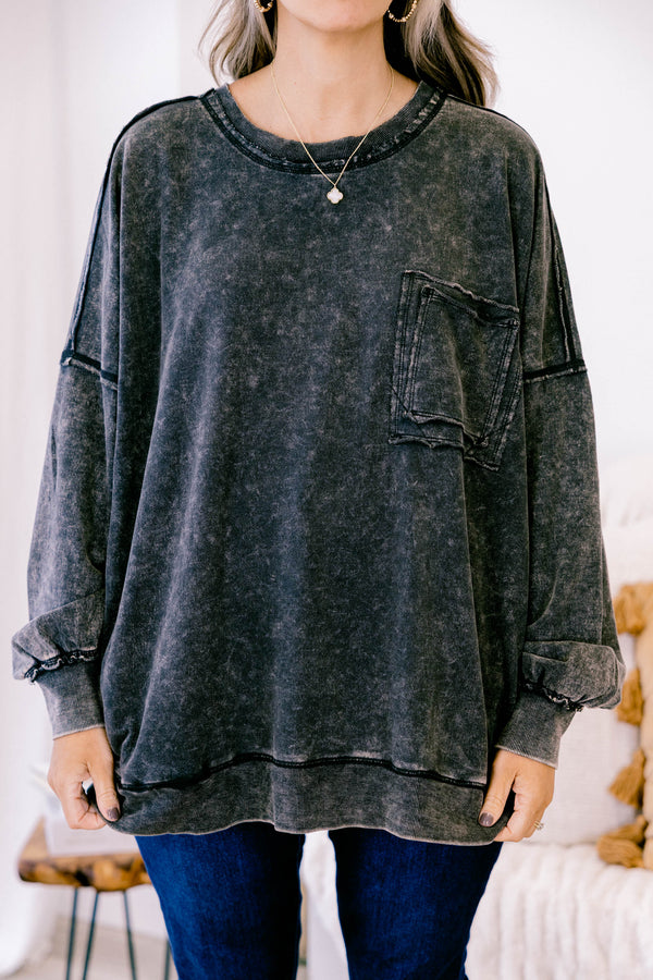 Chic Soul plus size clothing, ash black long sleeve casual top with an acid washed pattern as well as a front pocket and black stitching details on the sleeves and bottom of the shirt  