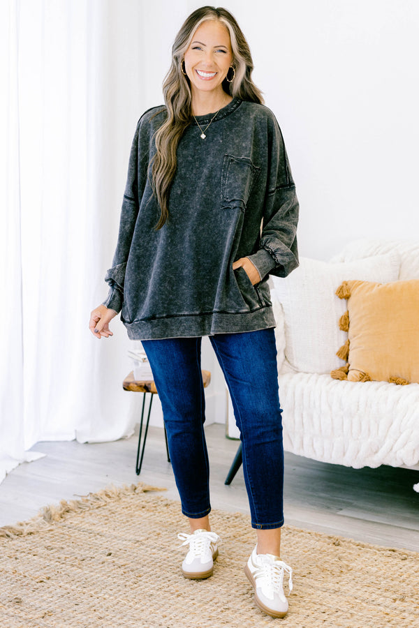 Chic Soul plus size clothing, ash black long sleeve casual top with an acid washed pattern as well as a front pocket and black stitching details on the sleeves and bottom of the shirt  
