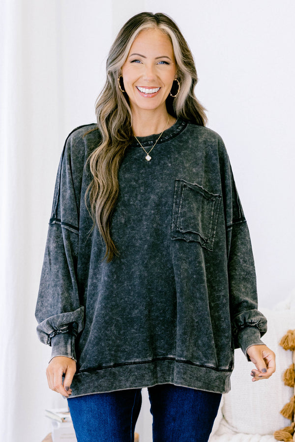 Chic Soul plus size clothing, ash black long sleeve casual top with an acid washed pattern as well as a front pocket and black stitching details on the sleeves and bottom of the shirt  