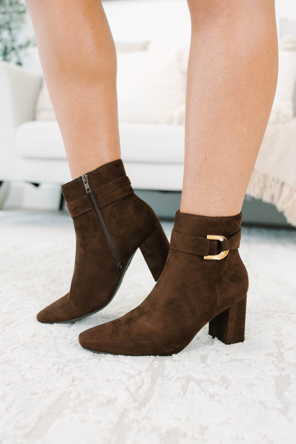Plus Size brown microsuede ankle booties with a pointed toe and gold-tone buckle accent.