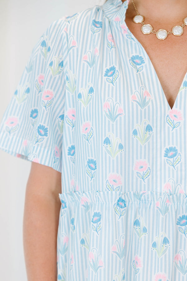 Plus Size baby blue striped tiered dress with a split v-neck and floral pattern.