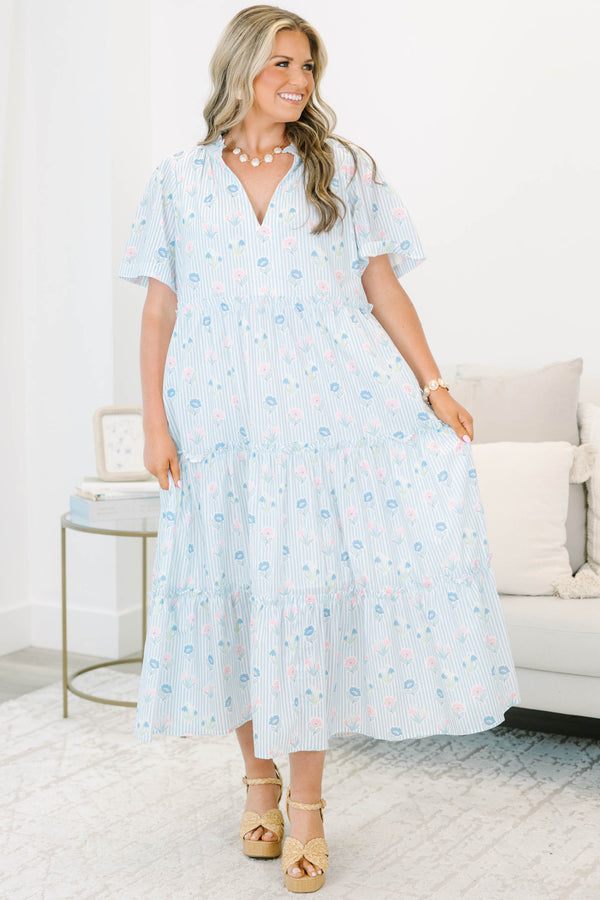 Plus Size baby blue striped tiered dress with a split v-neck and floral pattern.