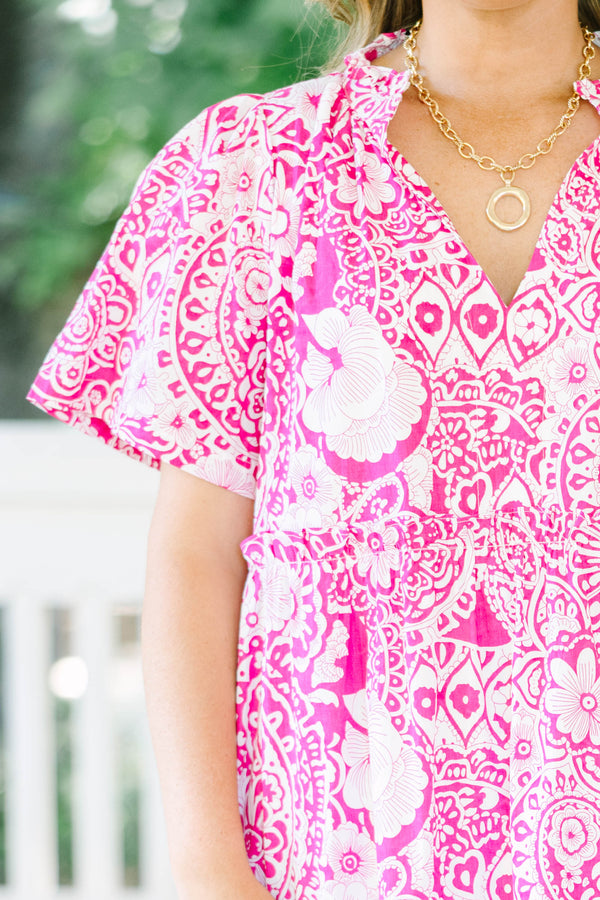 Plus size fuchsia and white floral print midi dress with a flowy tiered silhouette and V-neckline.