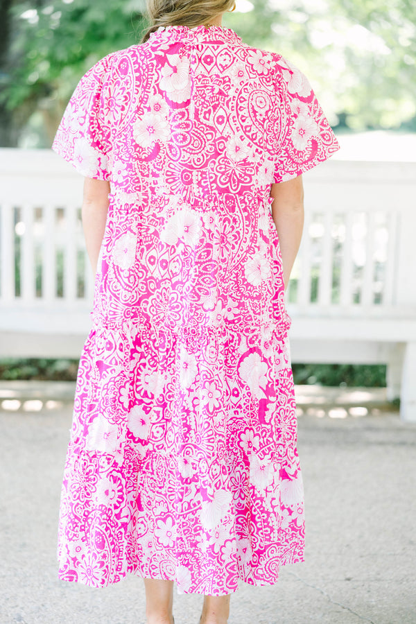 Plus size fuchsia and white floral print midi dress with a flowy tiered silhouette and V-neckline.