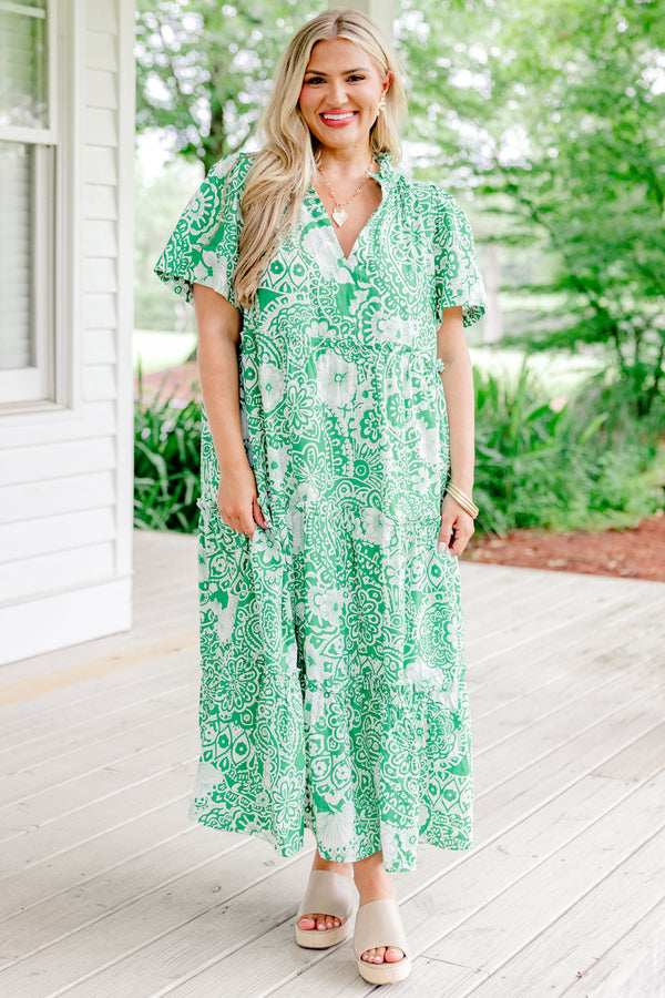 Chic Soul Plus size clothing, green maxi dress with a white floral pattern slight v-neckline and short sleeves 
