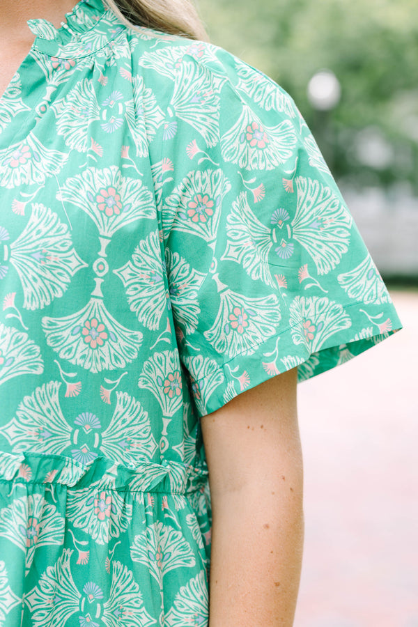 Plus Size Kelly Green tiered midi dress with a white floral pattern, V-neckline, and short sleeves.