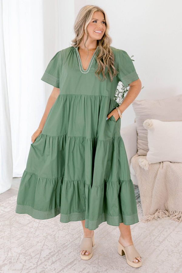Chic Soul plus size clothing, muted sage green short sleeve v neck tiered maxi dress with white stitching detailing on the neckline