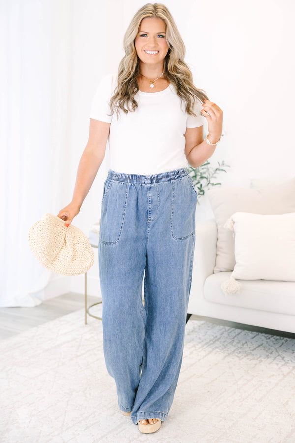 Plus Size wide-leg chambray pants with an elastic waistband and large front patch pockets.