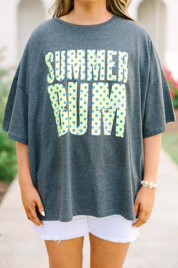 Plus Size charcoal boyfriend tee with yellow and blue polka dot 'SUMMER BUM' text and white shorts.